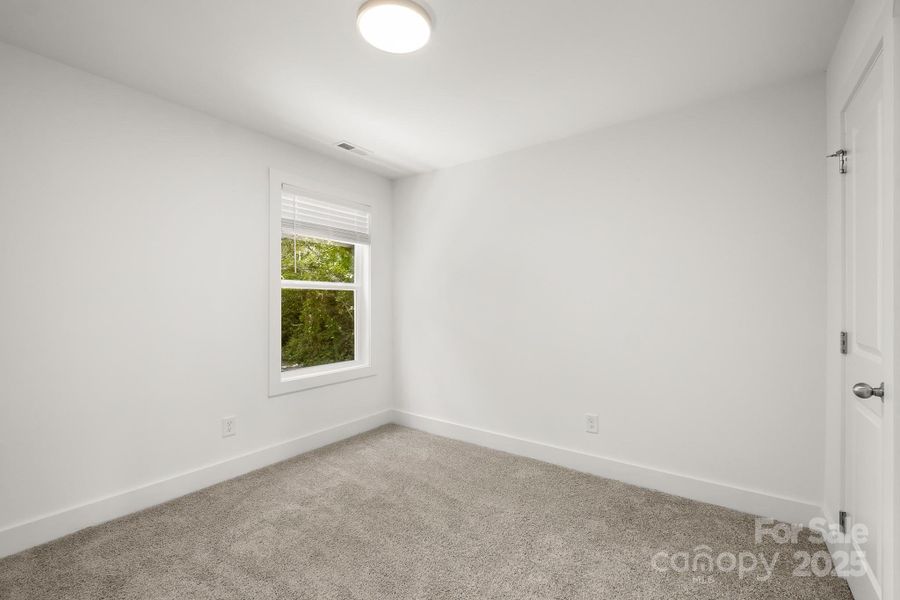 Spacious, unfurnished interior of a new home in , Albemarle (Image 27).