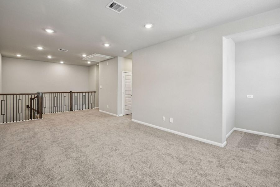 Spacious, unfurnished interior of a new home in Spring Brook Village - Luxe Series, Houston (Image 16).