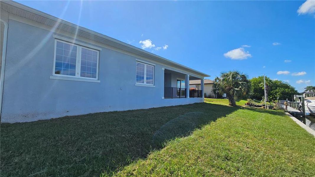 Exterior details and patio area of a home in , Port Charlotte (Image 14).