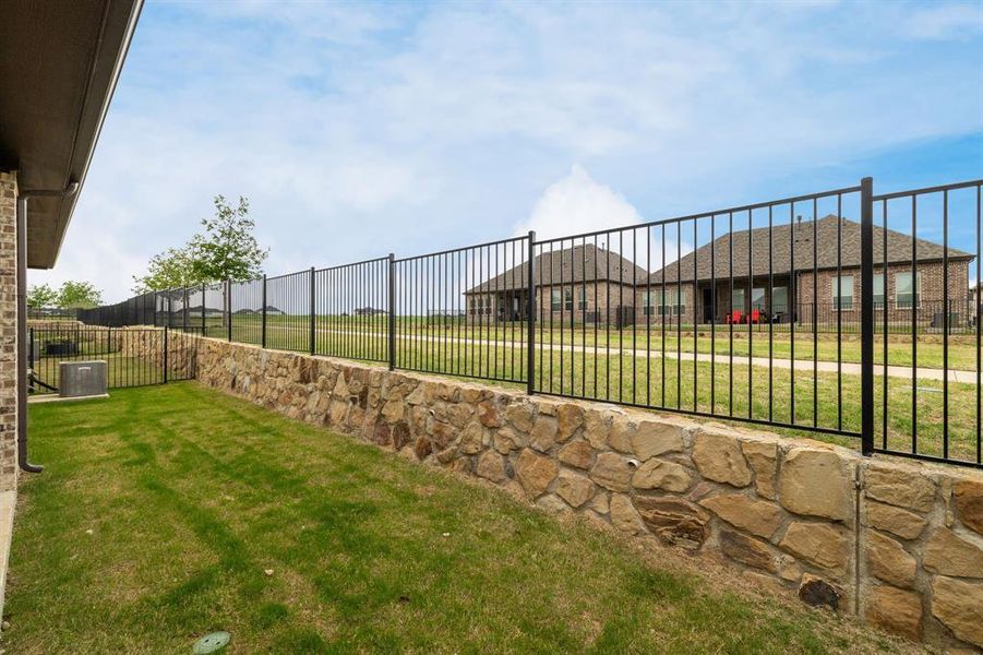 Exterior details and patio area of a home in , Prosper (Image 19). Exterior details and patio area of a home in , Prosper (Image 19).