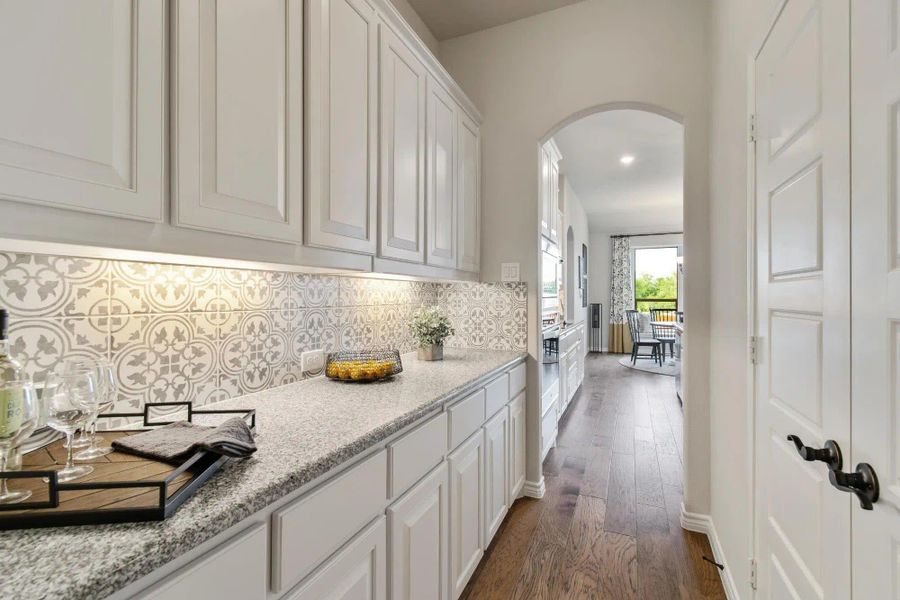 Kitchen | Concept 2434 at Coyote Crossing in Godley, TX by Landsea Homes