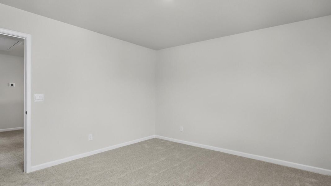 Spacious, unfurnished interior of a new home in Surfside Landing, Hubert (Image 32).