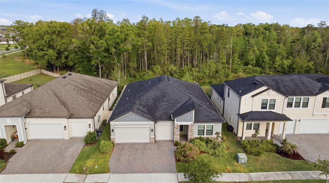 Front exterior of a new home in , Land O' Lakes, FL, highlighting curb appeal (Image 29).