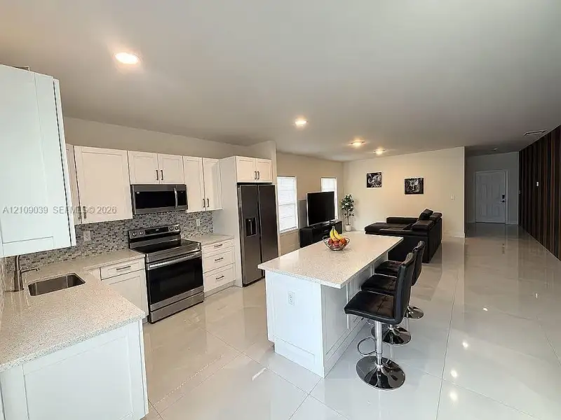 Furnished interior view inside a new home in , Goulds (Image 11).