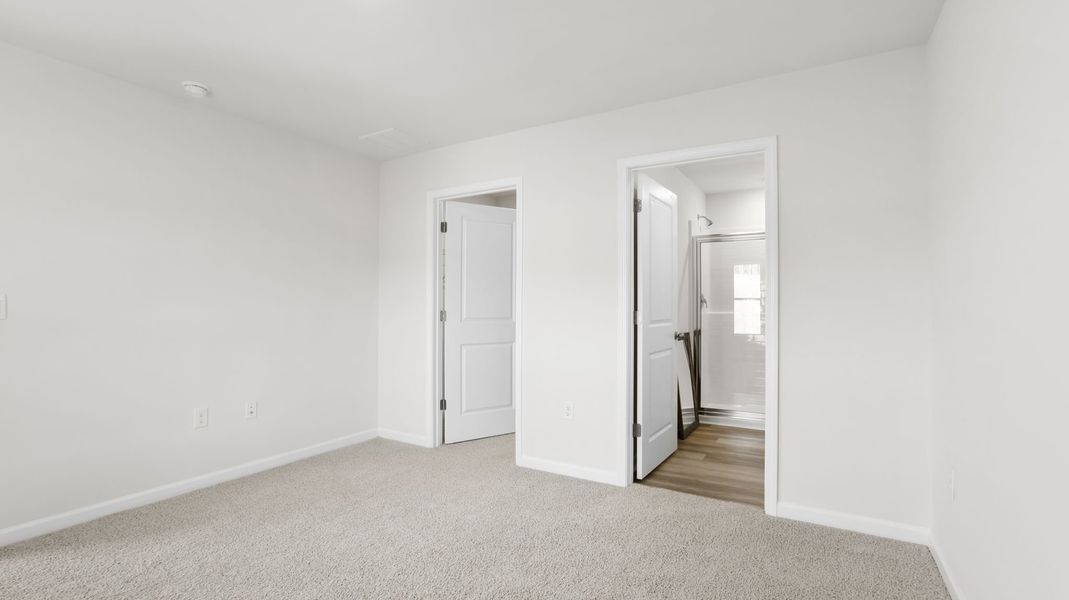 Spacious, unfurnished interior of a new home in Village Grove, Greenville (Image 26).