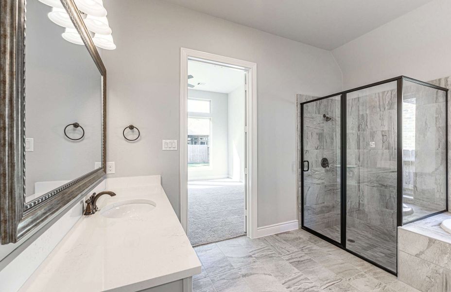 Representative furnished interior of a home built from the 3358 by Ravenna Homes in Artavia 70′, Conroe (Image 18).