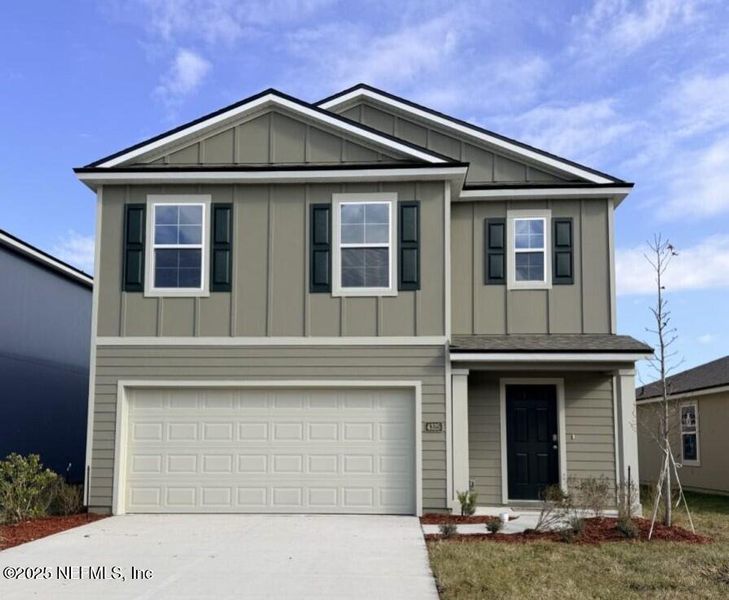 Front exterior of a new home in The Arbors, Jacksonville, FL, highlighting curb appeal (Image 21). Front exterior of a new home in The Arbors, Jacksonville, FL, highlighting curb appeal (Image 21).