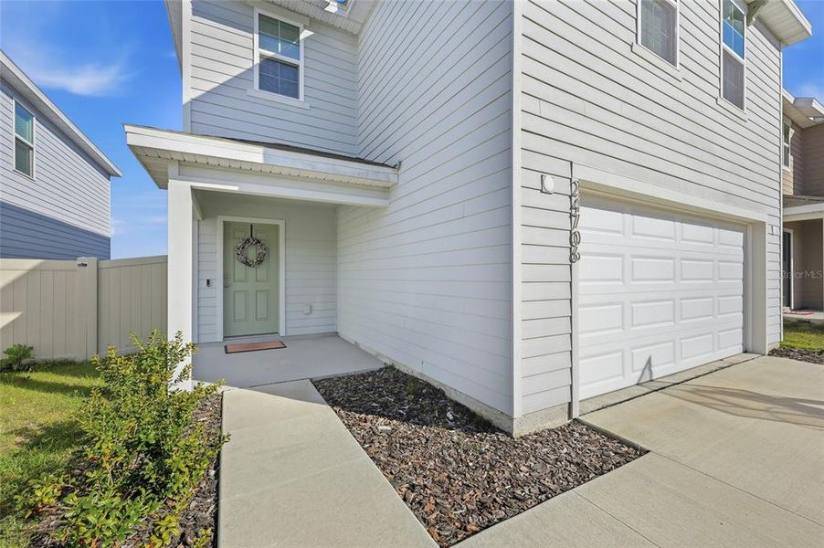 Exterior details and patio area of a home in Avalon Woods, Newberry (Image 25).