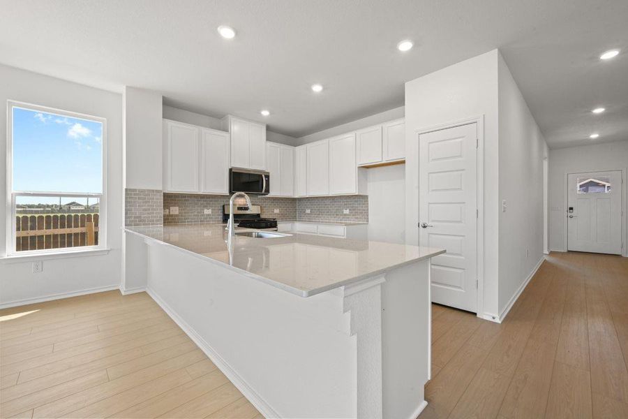 Furnished interior view inside a new home in Watermill-Classic Collection, Uhland (Image 6).