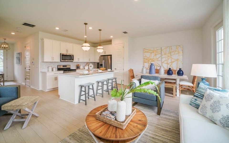Furnished interior in a model home at The Enclaves at Festival Cove in Davenport (Image 13).