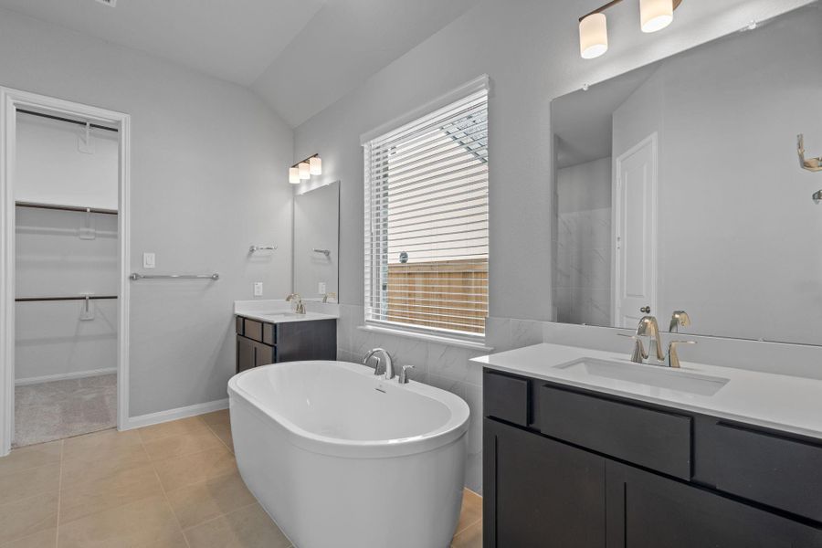 Furnished interior view inside a new home in Bridgeland 55', Cypress (Image 11).