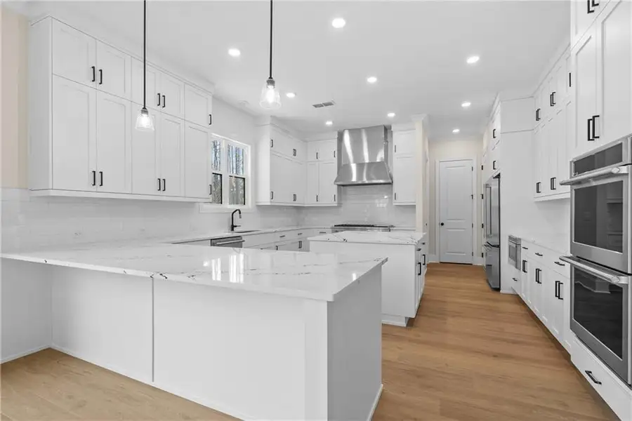 Furnished interior view inside a new home in Bellwyn, Johns Creek (Image 4).