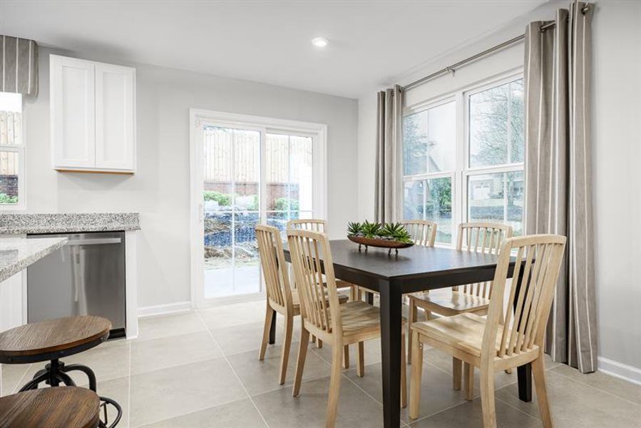 Furnished interior view inside a new home in Seminole Palms Townhomes, Palm Coast (Image 5).