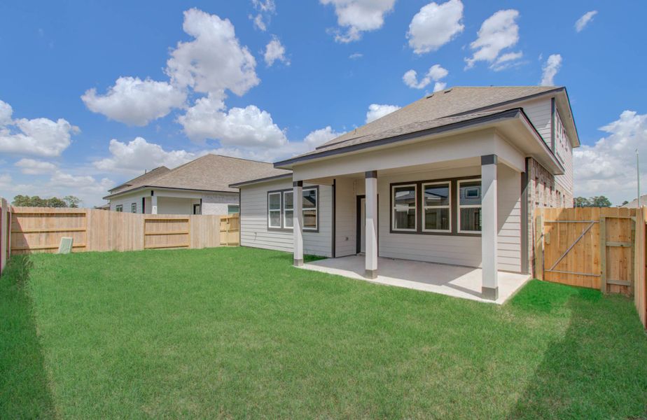 Exterior details and patio area of a home in Harmony Cove, Humble (Image 4).
