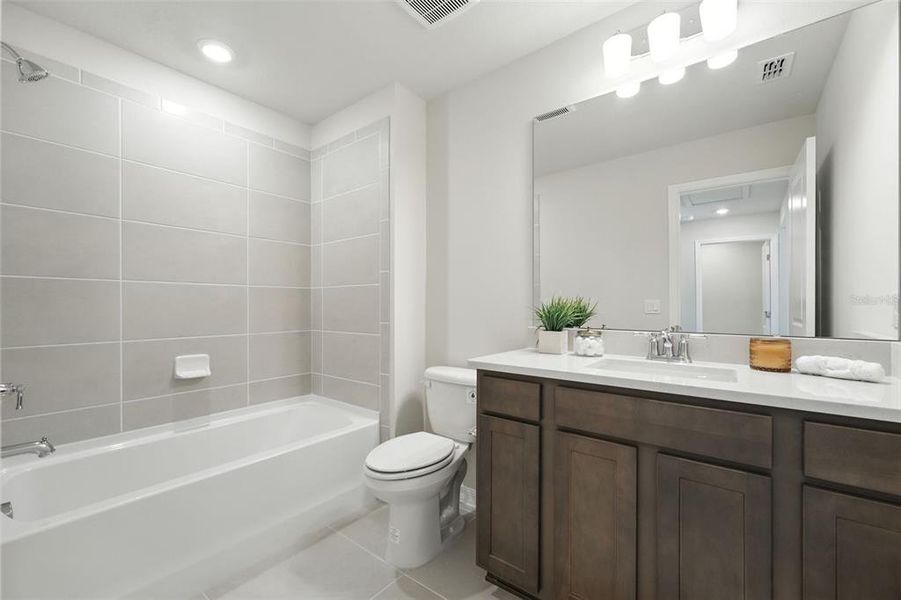 Furnished interior view inside a new home in Amelia Groves, St. Cloud (Image 14). Furnished interior view inside a new home in Amelia Groves, St. Cloud (Image 14).