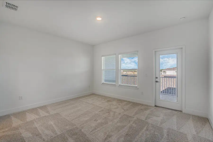 Spacious, unfurnished interior of a new home in Harvest at Ovation - Townhomes, Winter Garden (Image 22).