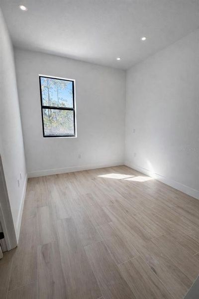 Spacious, unfurnished interior of a new home in , Port Charlotte (Image 17).