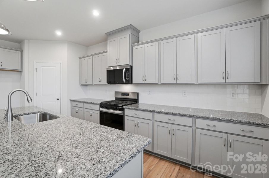 Furnished interior view inside a new home in Waxhaw Landing, Monroe (Image 12).