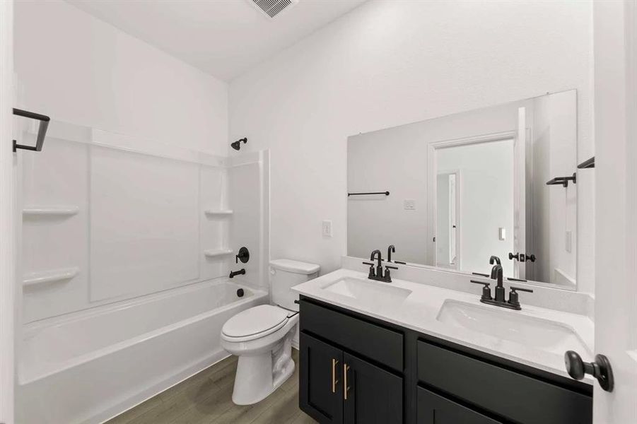 Furnished interior view inside a new home in Creekview Fossil Ridge, Pilot Point (Image 4).