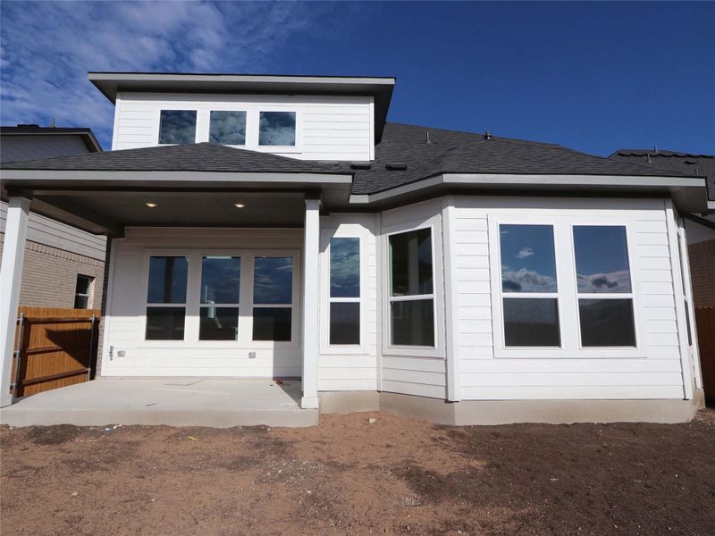 Exterior details and patio area of a home in Estancia West, Manchaca (Image 4). Exterior details and patio area of a home in Estancia West, Manchaca (Image 4).