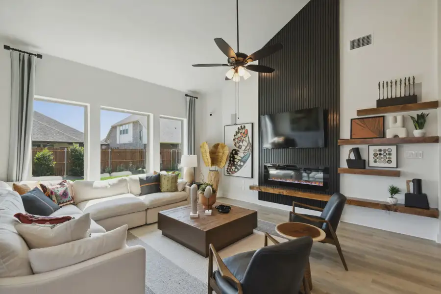 Representative furnished interior of a home built from the Wimberly by Chesmar Homes in Summer Crest, Crowley (Image 5).