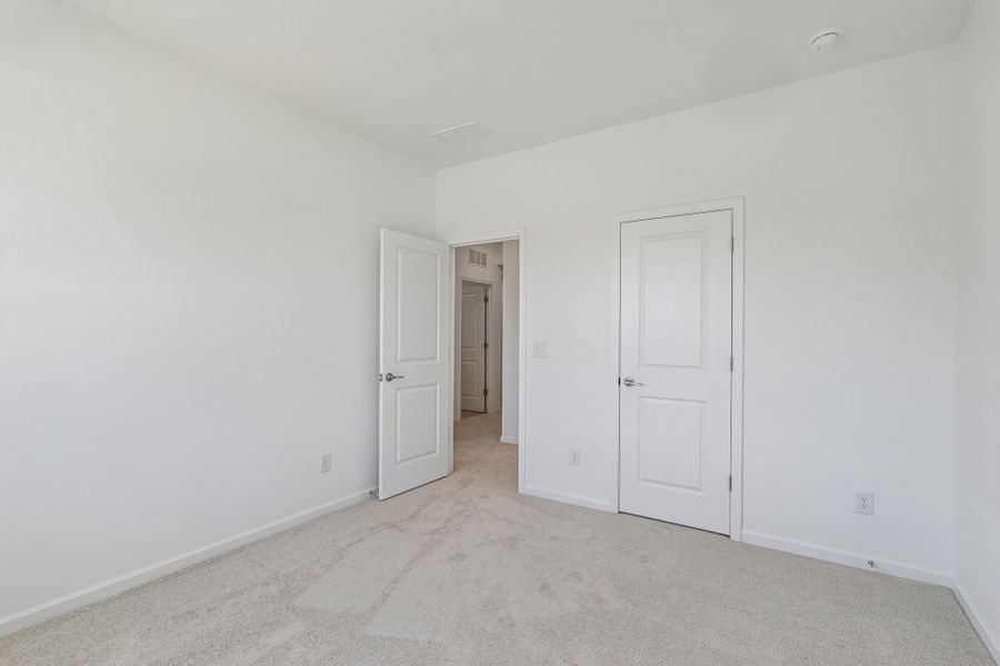 Spacious, unfurnished interior of a new home in Terraces at the Exchange, Fort Mill (Image 29).