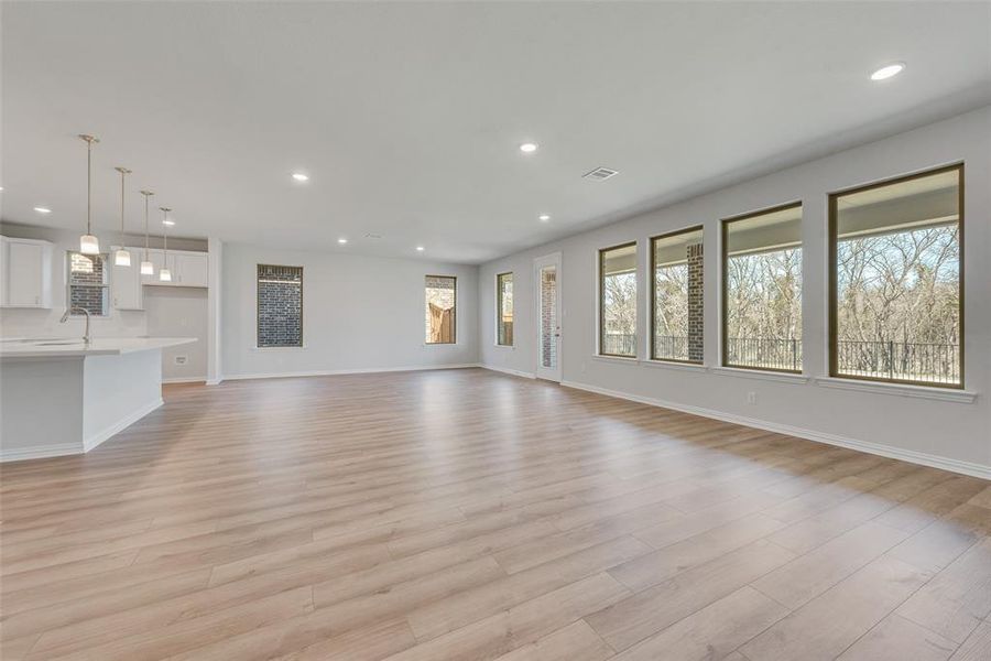 Spacious, unfurnished interior of a new home in Valencia On The Lake, Little Elm (Image 15).