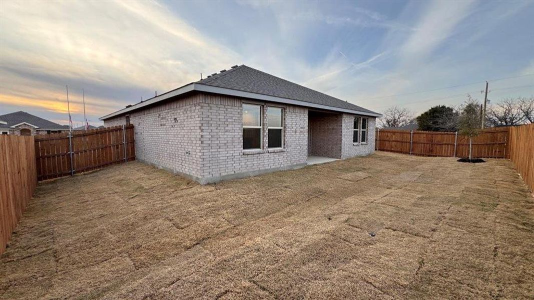Exterior details and patio area of a home in Meadowbrook Estates, Cleburne (Image 3).