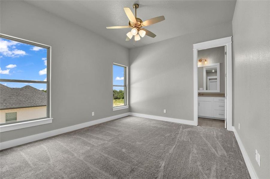 Full bathroom with toilet, tile floors, shower / tub combination, vanity, and a textured ceiling