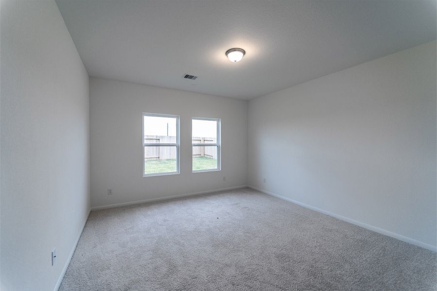 Spacious, unfurnished interior of a new home in Sweetgrass Village, Crosby (Image 30).
