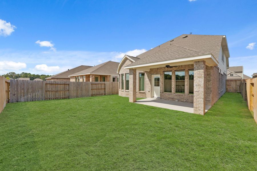 Exterior details and patio area of a home in The Trails, New Caney (Image 21).