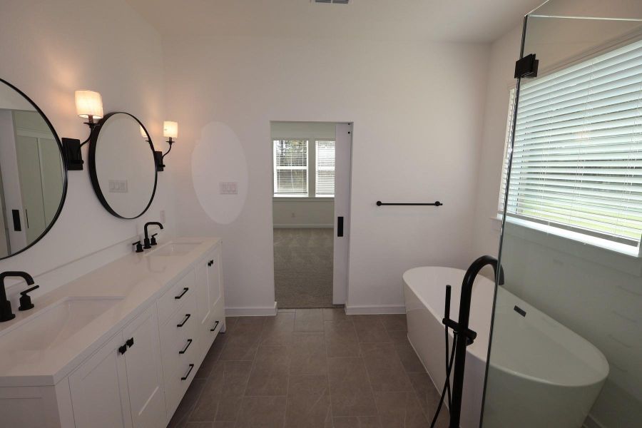 Furnished interior view inside a new home in Tarkington Timbers, Cleveland (Image 16).