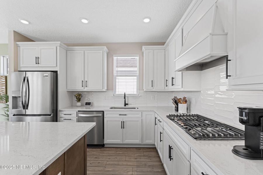 Furnished interior view inside a new home in Summer Bay at Grand Oaks, St. Augustine (Image 17).