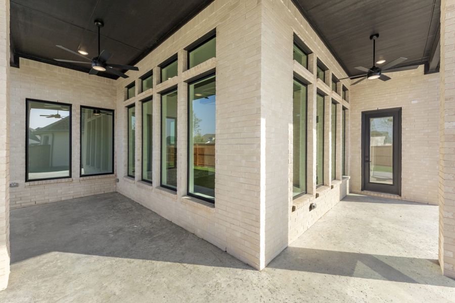 Representative exterior details of a home built from the 5521 by Tradition Homes in Windsong Ranch, Prosper (Image 18).