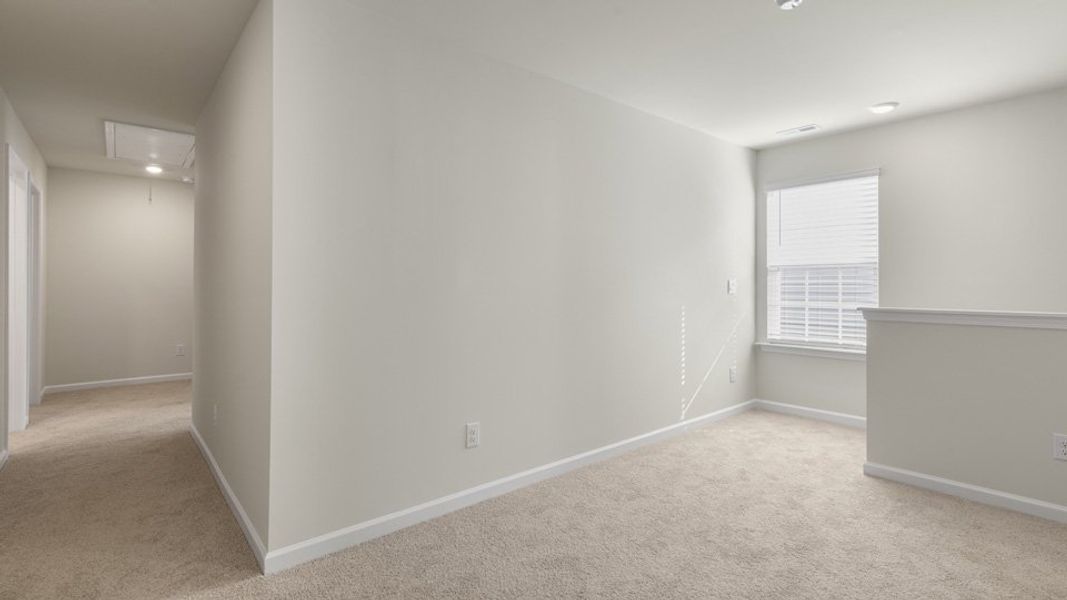Spacious, unfurnished interior of a new home in The Grove at Matthews Landing, Fuquay Varina (Image 16).