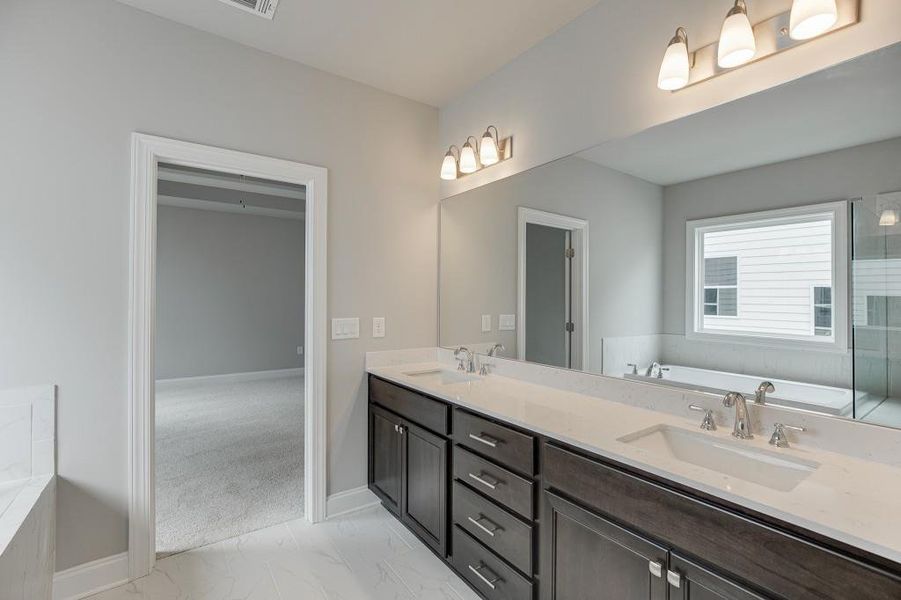 Furnished interior view inside a new home in , Suwanee (Image 6).