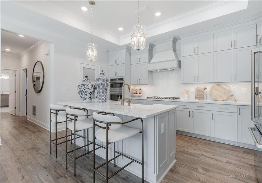 Furnished interior in a model home at The Courtyards by The Manor in Alpharetta (Image 15).