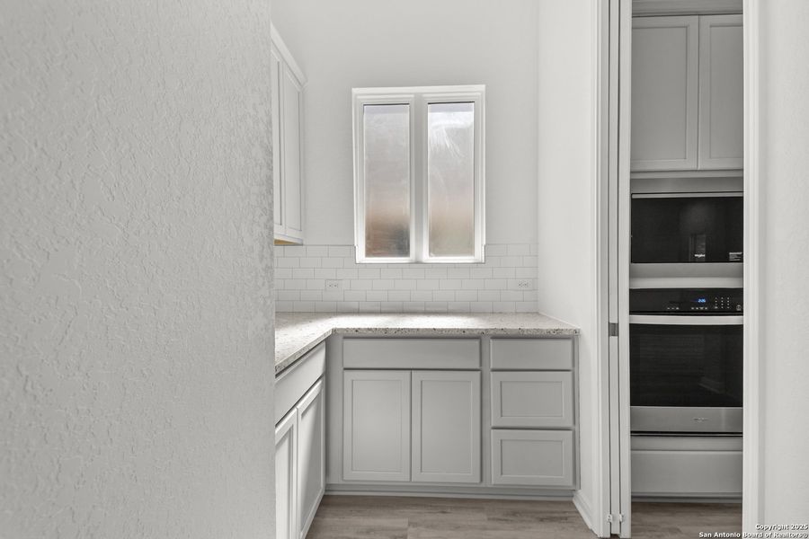 Furnished interior view inside a new home in Stillwater Ranch 60', San Antonio (Image 11).