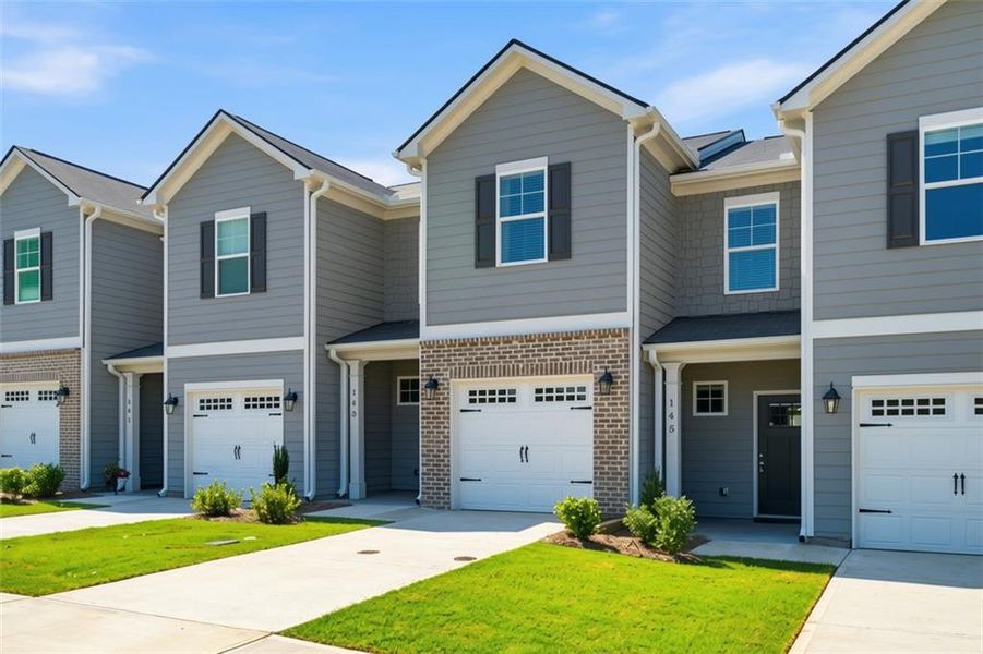 Front exterior of a new home in , Cartersville, GA, highlighting curb appeal (Image 24).