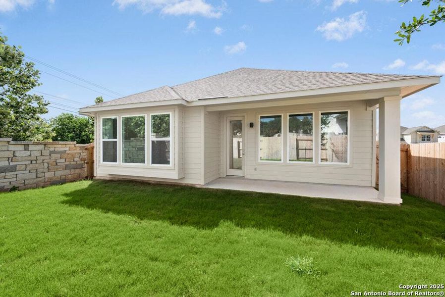 Front exterior of a new home in Park Hill Commons, San Antonio, TX, highlighting curb appeal (Image 1).