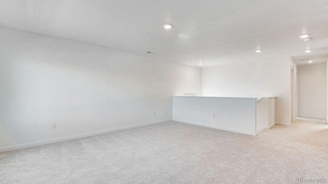 Spacious, unfurnished interior of a new home in Trails at Crowfoot, Parker (Image 28).