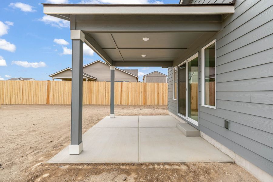 Exterior details and patio area of a home in Willowbrook, Madras (Image 19).