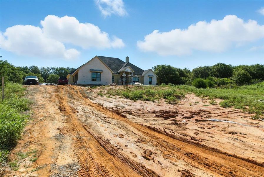 View of front of home featuring driveway View of front of home featuring driveway