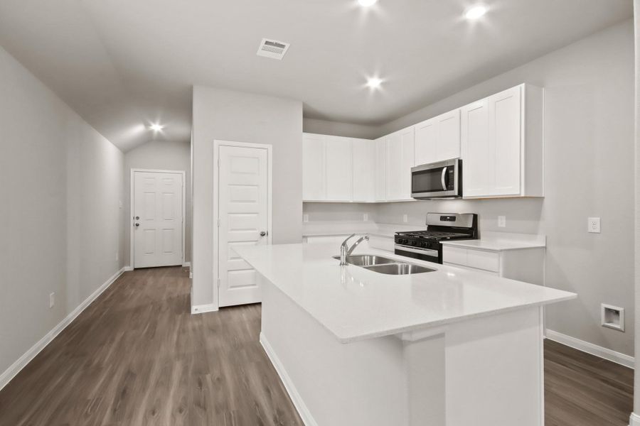 Furnished interior view inside a new home in Ridgeland Hills, Willis (Image 3). Furnished interior view inside a new home in Ridgeland Hills, Willis (Image 3).