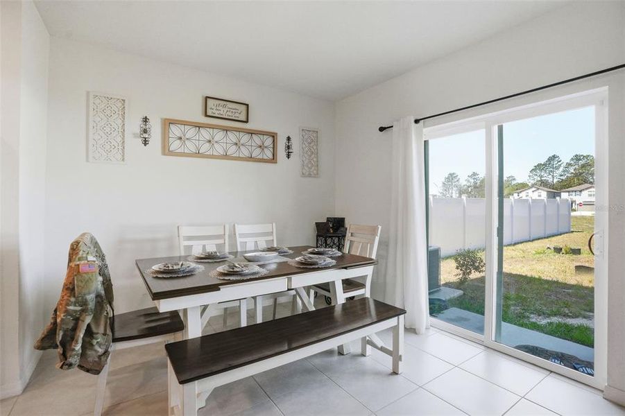Furnished interior view inside a new home in The Isle of Avalon, Spring Hill (Image 16).