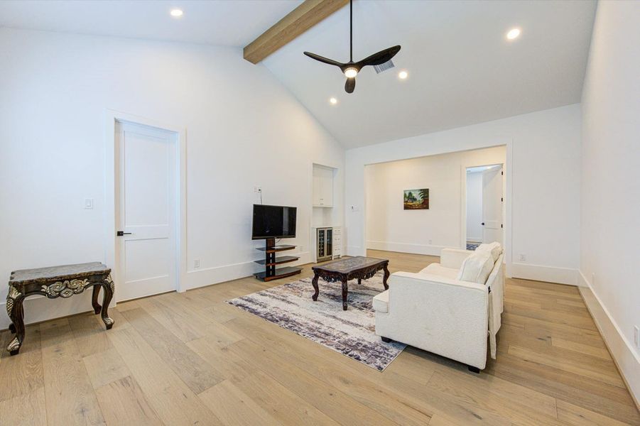 Game room features cathedral ceiling and wide-plank hardwood floors. Large windows for tons of natural lights.