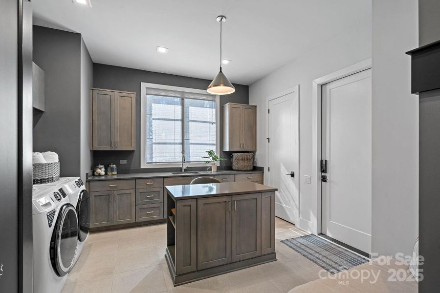 Laundry and Utility Room off of Garage