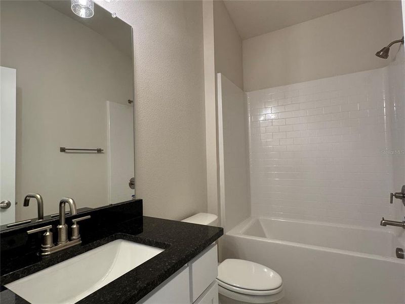 Furnished interior view inside a new home in Harmony Central, Harmony (Image 8).