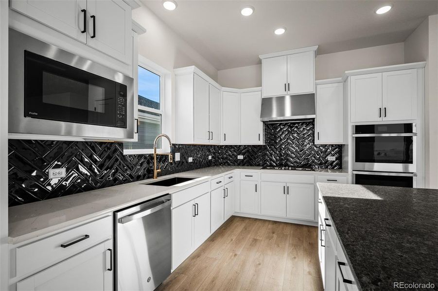 Furnished interior view inside a new home in Wolf Ranch - Enclave Collection, Colorado Springs (Image 14).