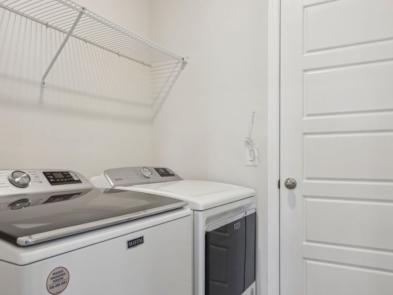 Laundry room in the Ibis floorplan at 44518 Cable Creek Dr